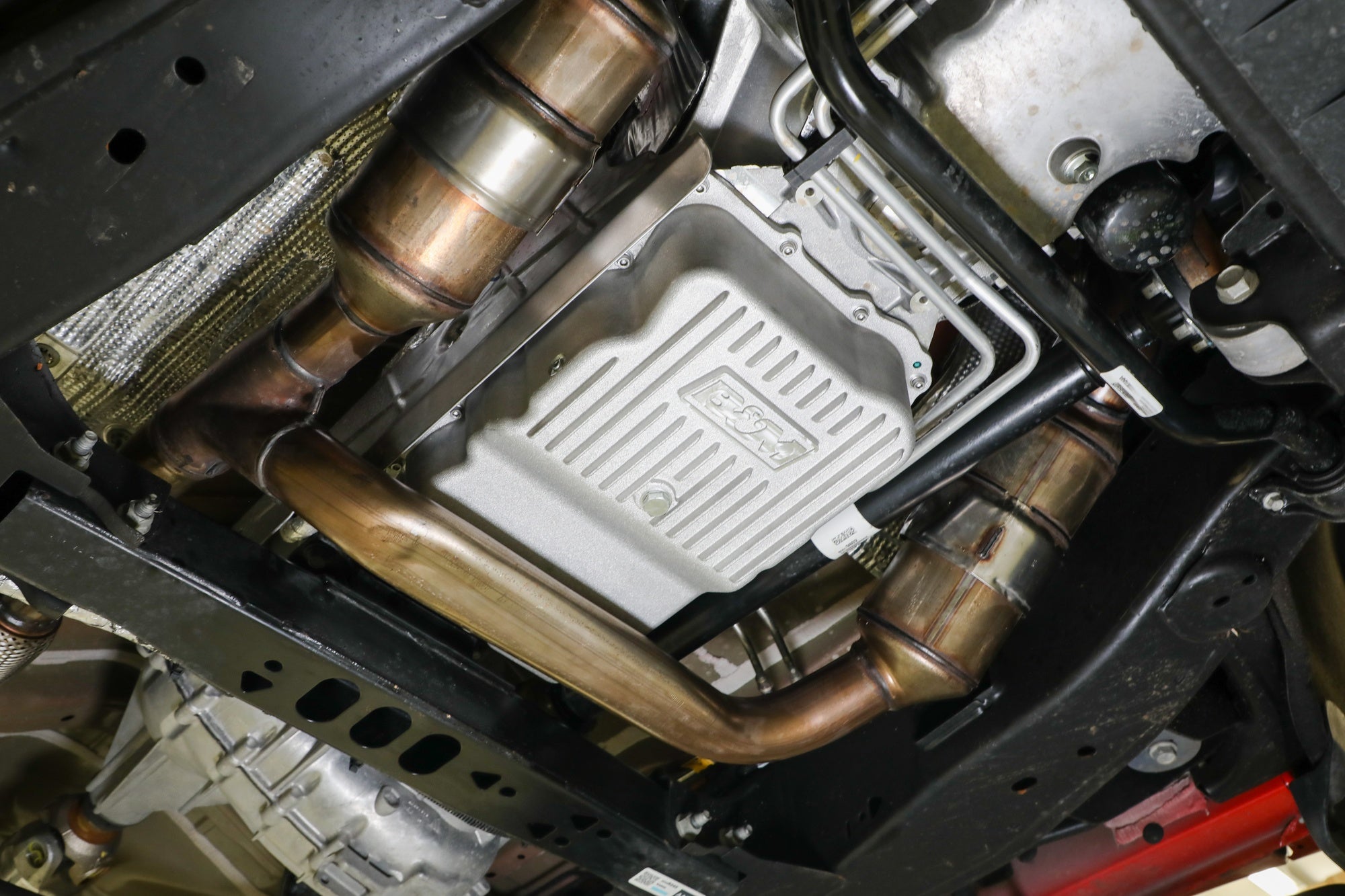 B&M Hi-Tek Heavy-Duty Deep Transmission Pan -  GM 10L80 - Aluminum - Natural - Photo - Close Up Left