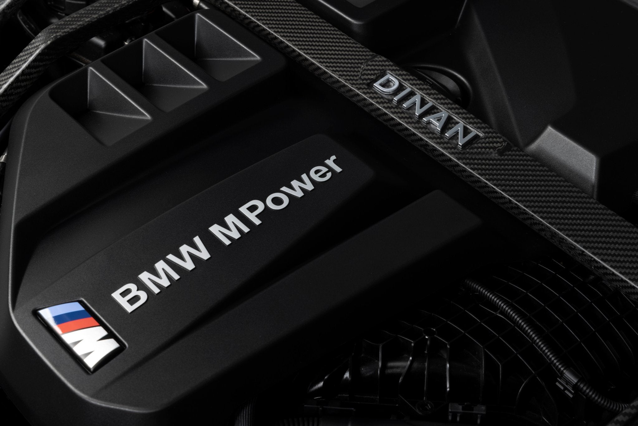 Dinan Matte Carbon Fiber Strut Tower Brace - 2021-2026 BMW M2/M3/M4 - Photo - out of package Left