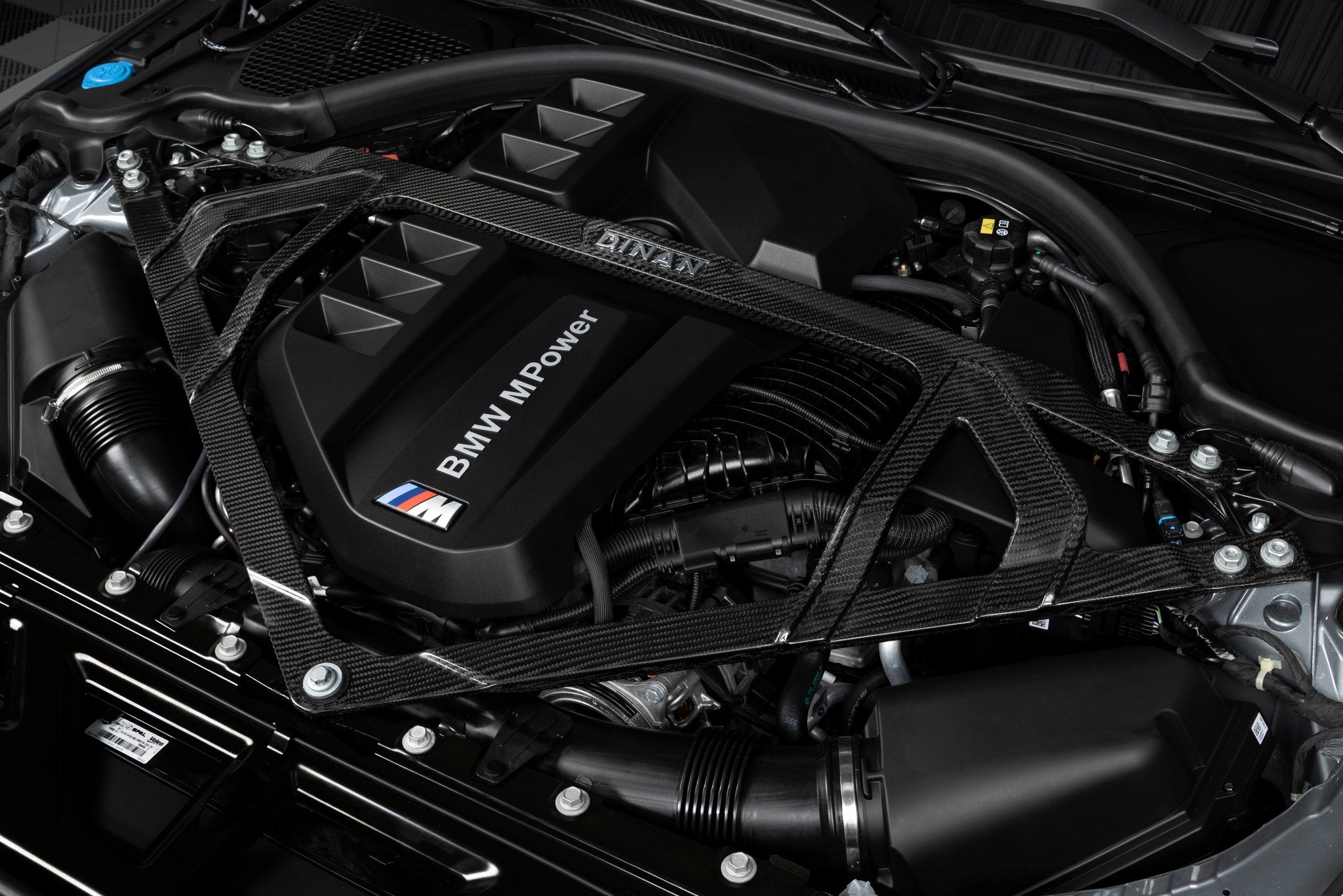 Dinan Gloss Carbon Fiber Strut Tower Brace - 2021-2026 BMW M2/M3/M4 - Photo - out of package Left