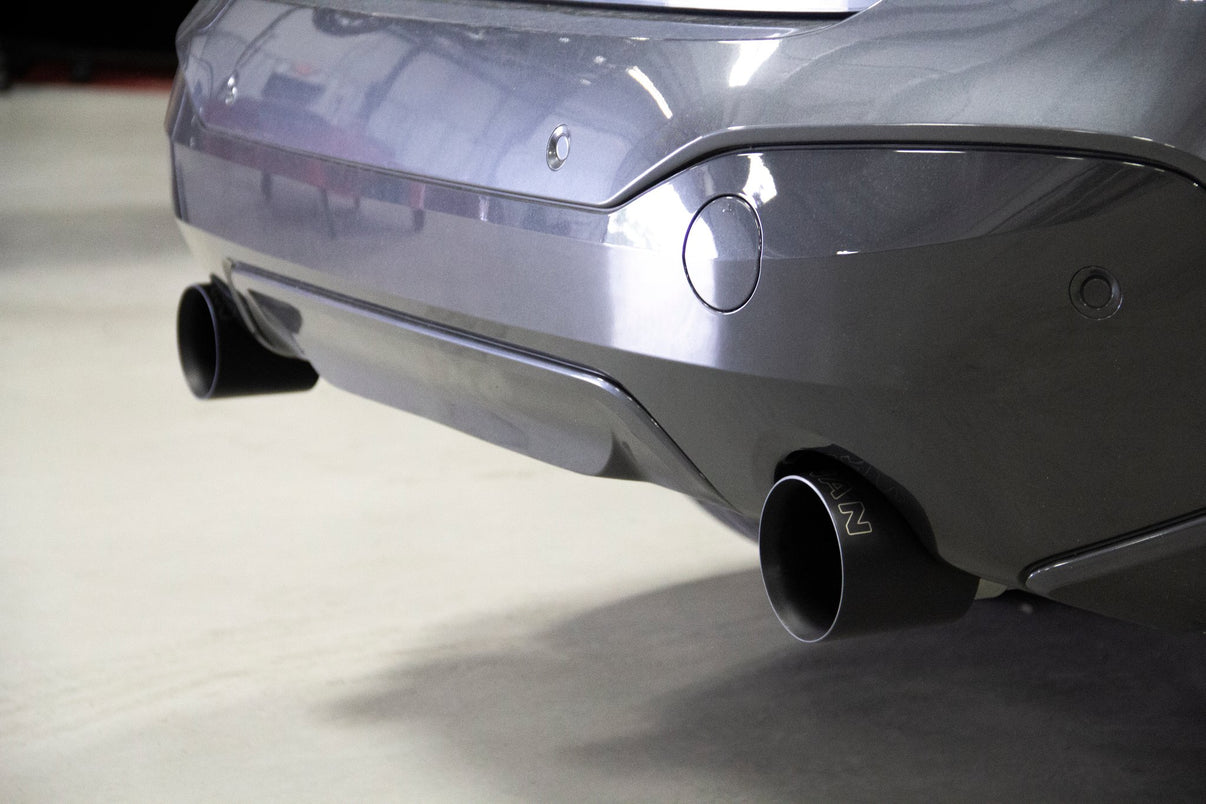 Dinan Valved Axle-Back Exhaust - 2016-2023 BMW X1/X2 xDrive28i - Photo - out of package Left