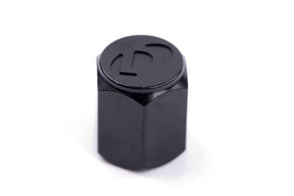 Dinan Valve Stem Caps - Photo - out of package Right