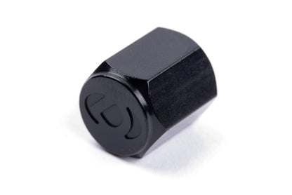 Dinan Valve Stem Caps - Photo - out of package Left