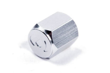 Dinan Valve Stem Caps - Photo - out of package Left