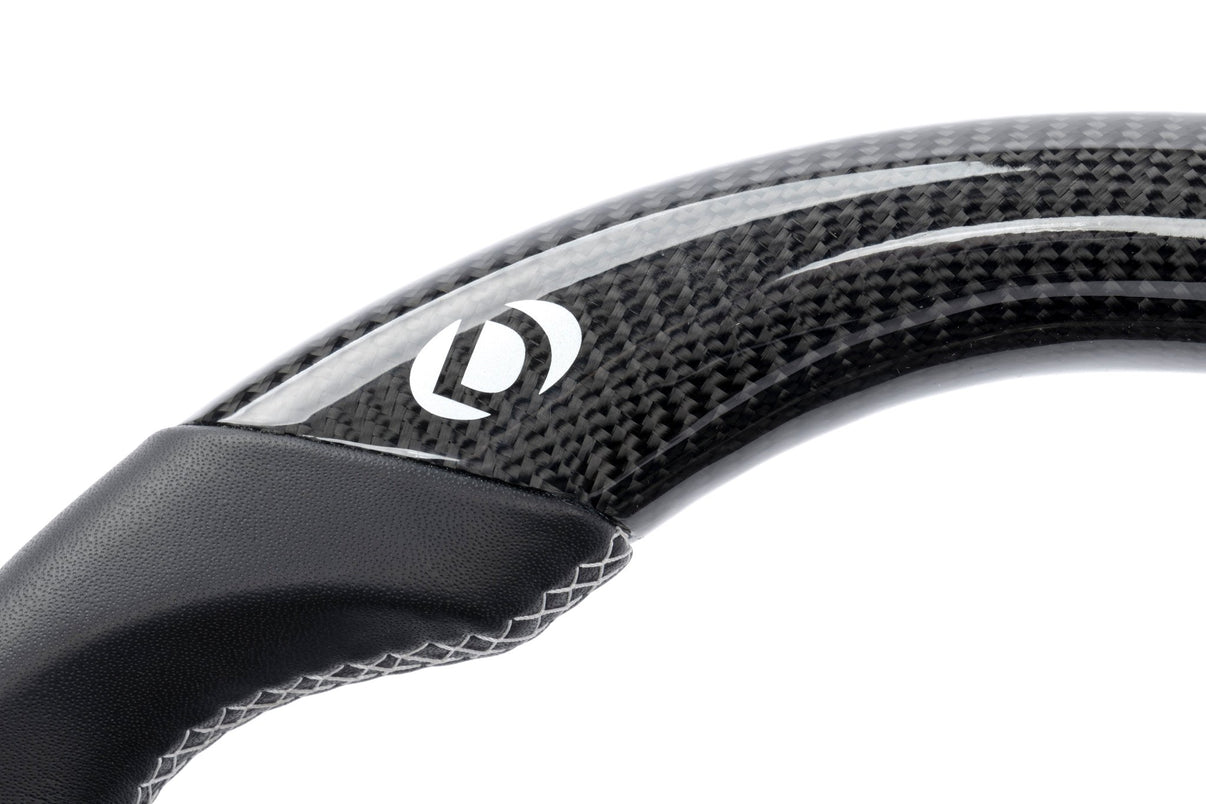 Dinan Steering Wheel - Carbon Fiber with Leather Grips (Non-Heated) - Photo - out of package Side
