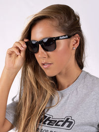 Lunettes de soleil fantaisie - Noires avec logo blanc